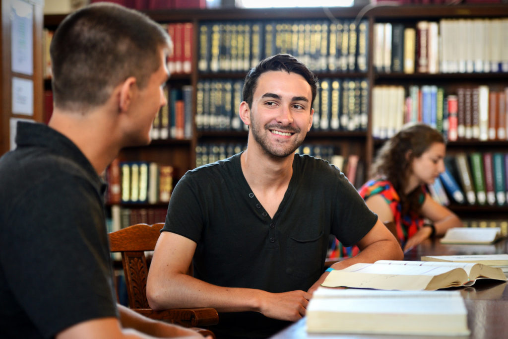 student in library in-line