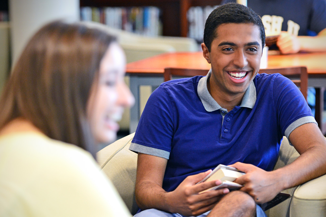 student smiling with friends